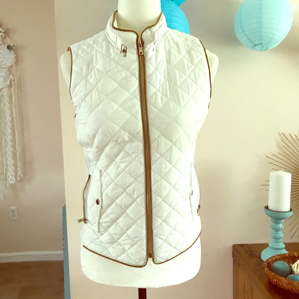 White vest.